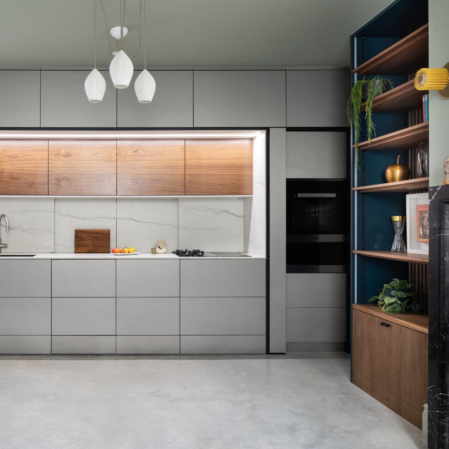 A Wall of Minimalist Cabinets Keeps This Kitchen Hidden Away Apartment Therapy